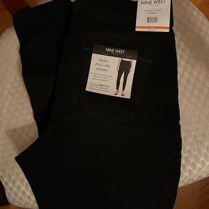 New, with tag.  Nine West black pull on skinny pants.